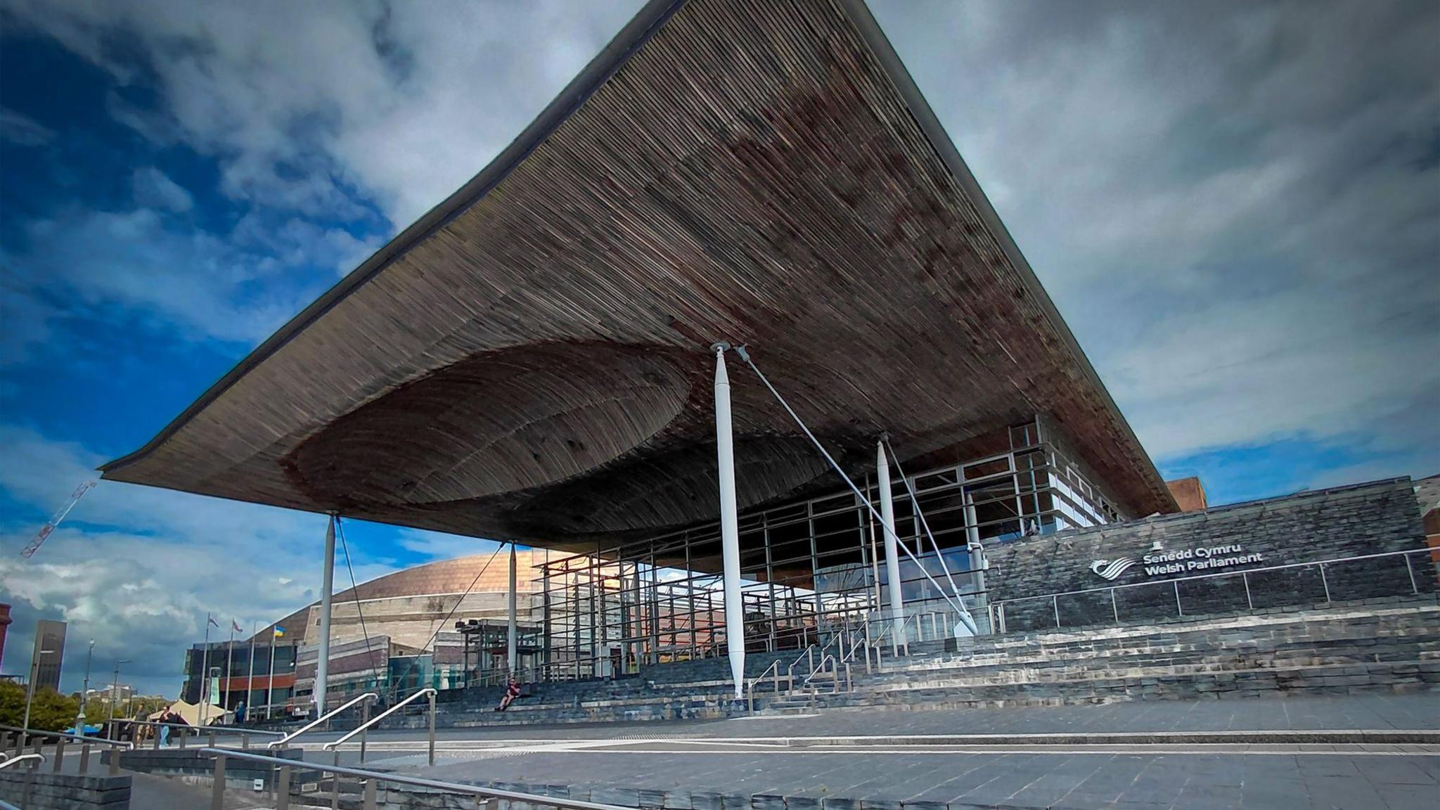 View of the Senedd building and steps from outside.