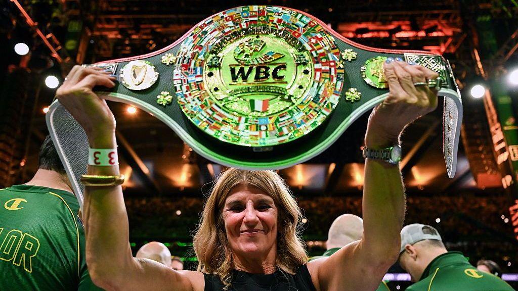 Bridget Taylor holding WBC belt