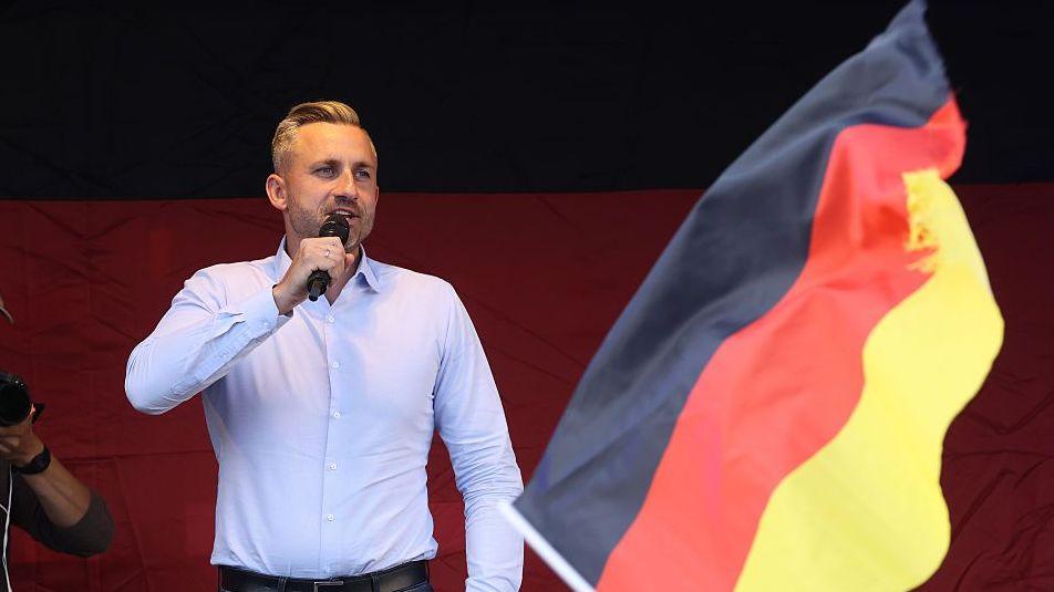 Ulrich Siegmund, lead candidate of the far-right Alternative for Germany (AfD), speaks to voters at an AfD campaign rally