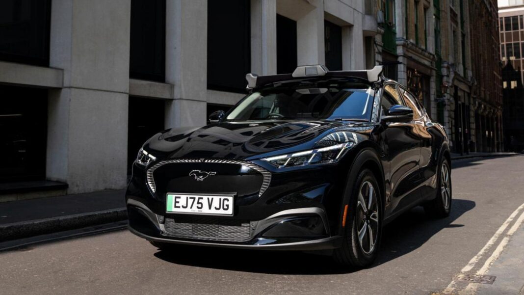 Uber to cut over 3,000 jobs in major global restructuring A black, hatchback car with a camera visible on its roof