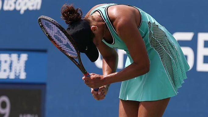 Madison Keys reacts after losing a point during her third round match