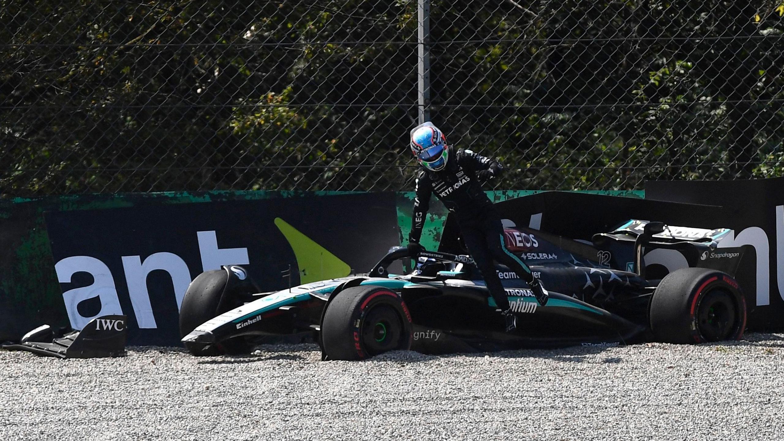 Kimi Antonelli climbs out of his Mercedes after crashing in first practice for the 2024 Italian Grand Prix at Monza