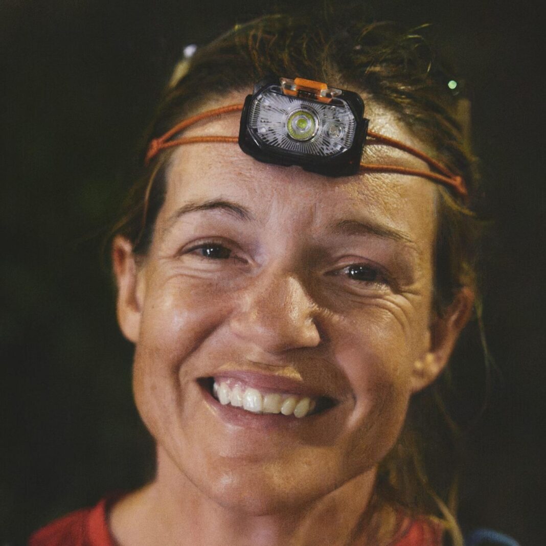 Sophie Woods wearing a head torch
