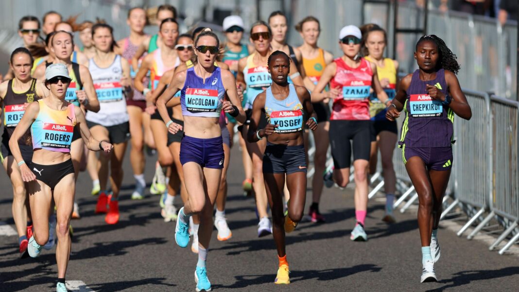 Eilish McColgan and Brigid Kosgei run side by side among the elite female runners at the start of the Great North Run
