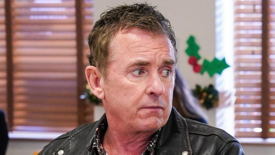 Shane Richie banned from driving after speeding Actor Shane Richie as Alfie Moon in EastEnders. A head and shoulders picture of him sitting in a room looking to his left. He is wearing a leather jacket with a floral shirt underneath.