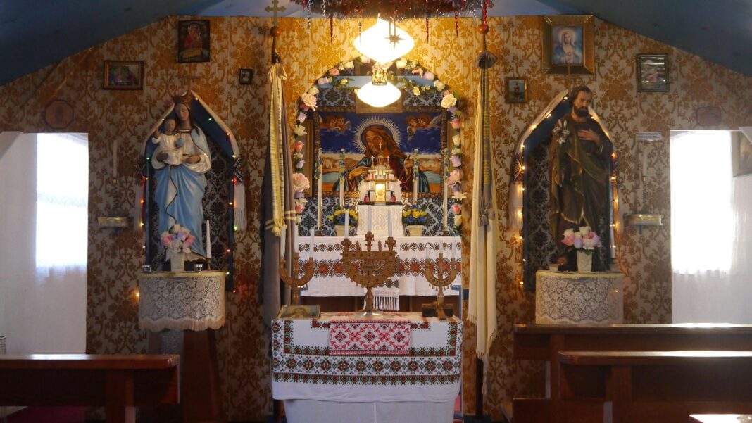 ‘He will be forever 21’: Tribute to former UK school pupil killed in Ukraine An interior view of the Ukrainian chapel in Lockerbie with an altar, statues and lights and candles