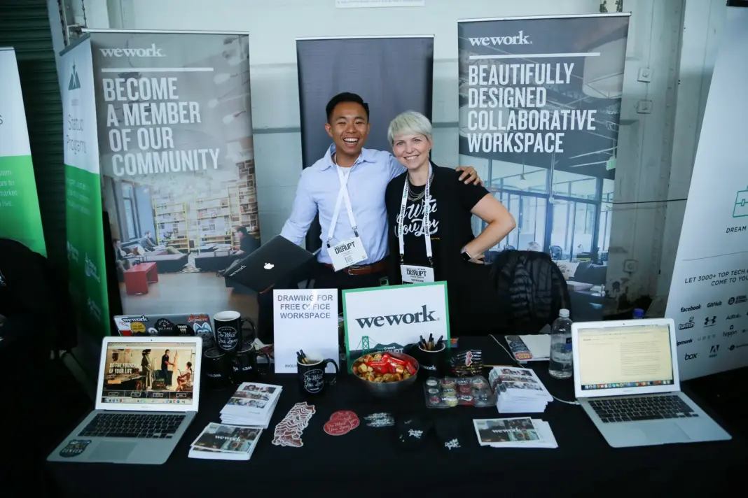 The clock is ticking: Final 24 hours to exhibit at TechCrunch Disrupt 2026 People working at the WeWork exhibit table at TechCrunch Disrupt NYC 2017