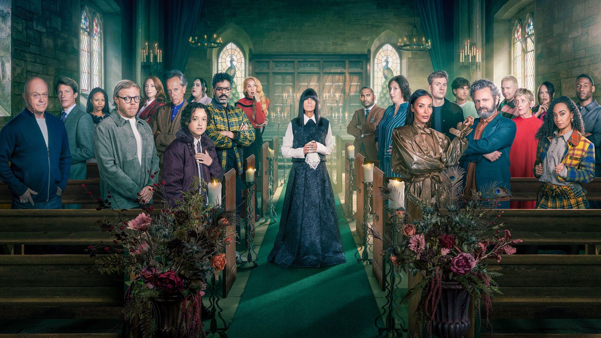 The Celebrity Traitors 2 constants all lined up inside the castle, either side of host Claudia Winkleman