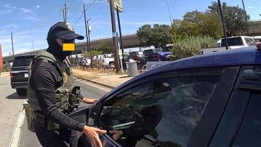 Images of the traffic stop taken from an officer's body camera were included in the affidavit