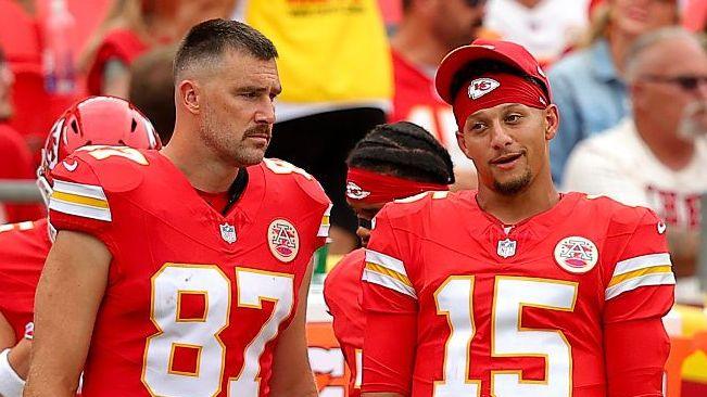 Travis Kelce and Patrick Mahomes talk on the sidelines during the Kansas City Chiefs' pre-season game against the Los Angeles Rams in August 2026