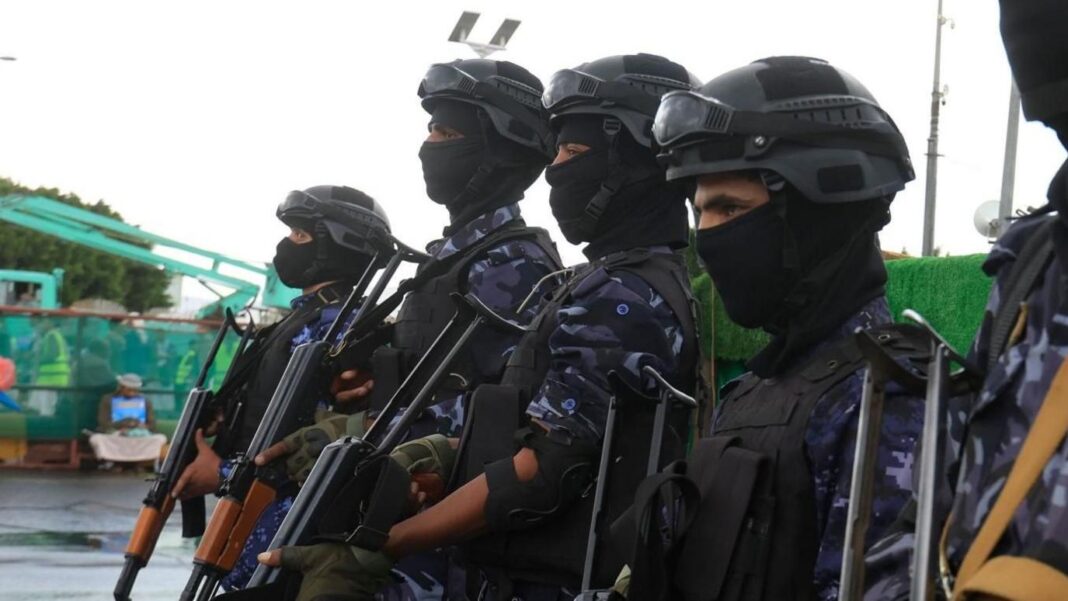 Houthi troopers stand guard during a protest against Saudi Arabia, in Sana'a, Yemen.