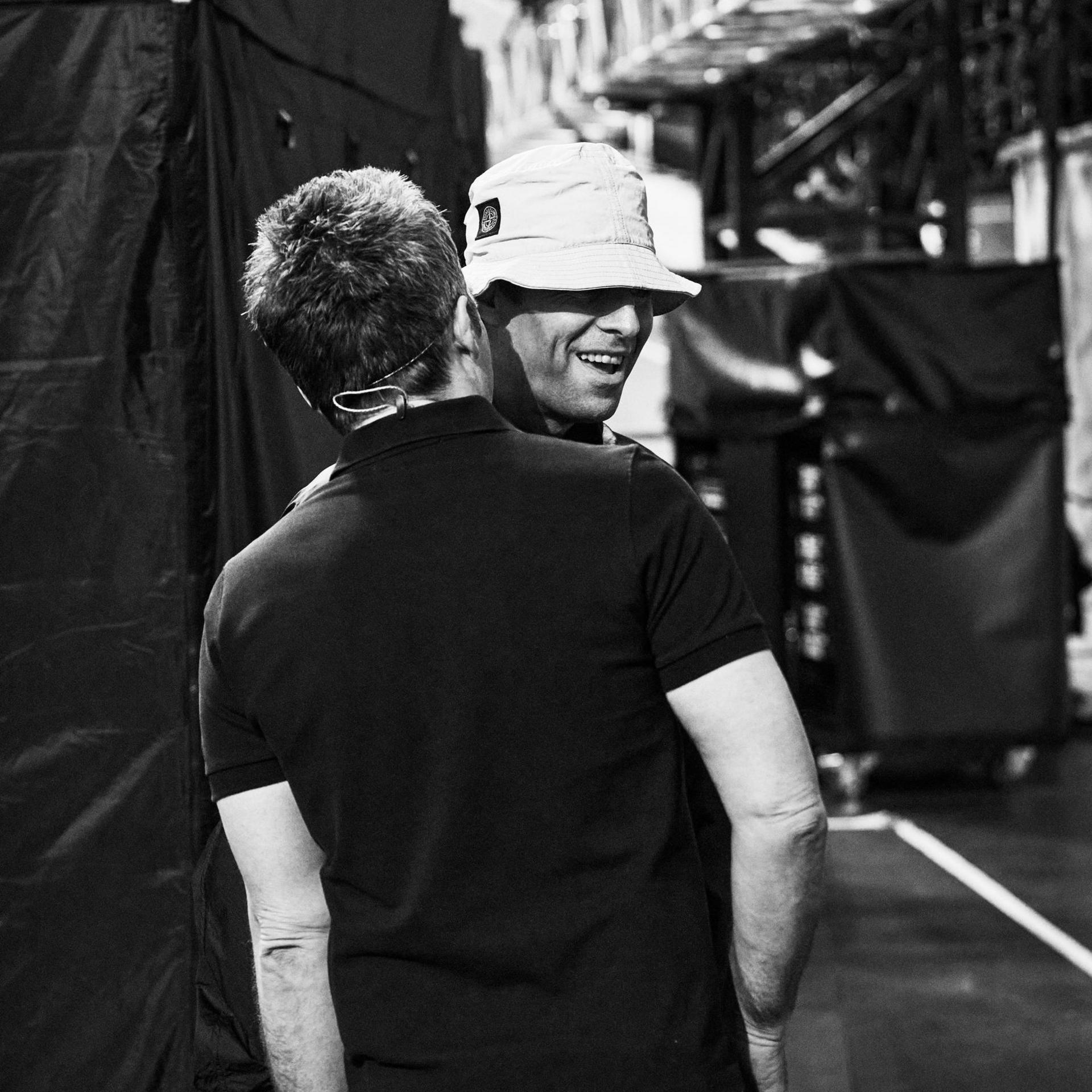 A backstage shot of Noel and Liam Gallagher chatting from their documentary, Oasis: Don't Look Back In Anger