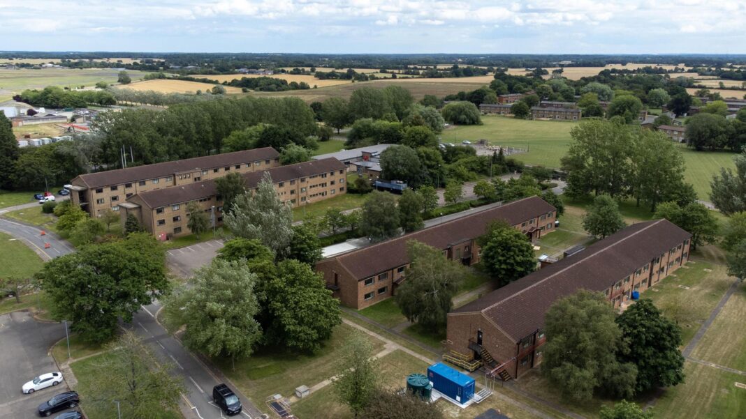 Patrols to start in Essex locations visited by asylum seekers Aerial shot of the housing blocks at an airbase. Four rectangular accommodation blocks can be seen, surrounded by grass, trees and roads. There are agricultural fields in the background.