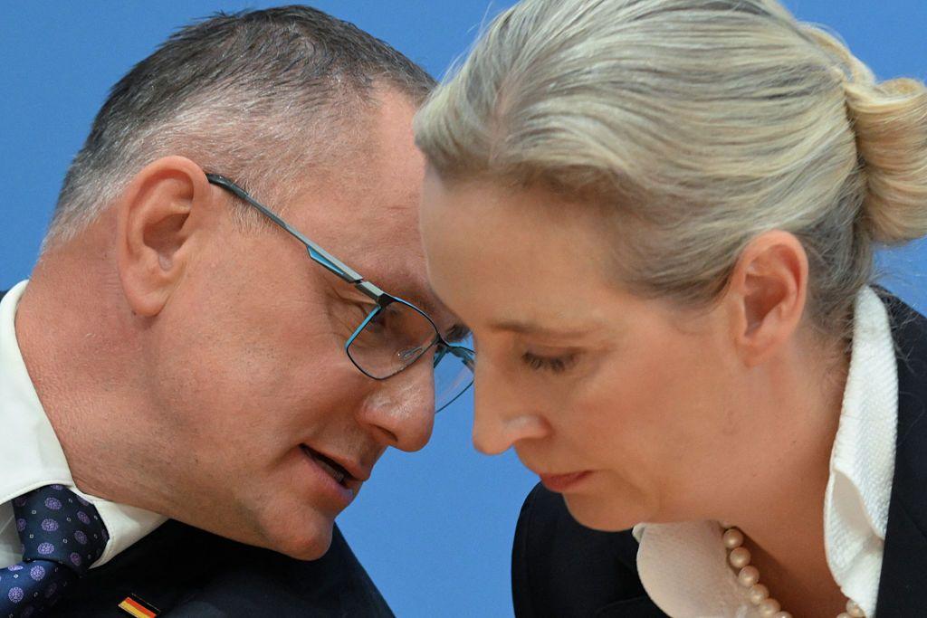 Tino Chrupalla and Alice Weidel speaking close up during a press conference