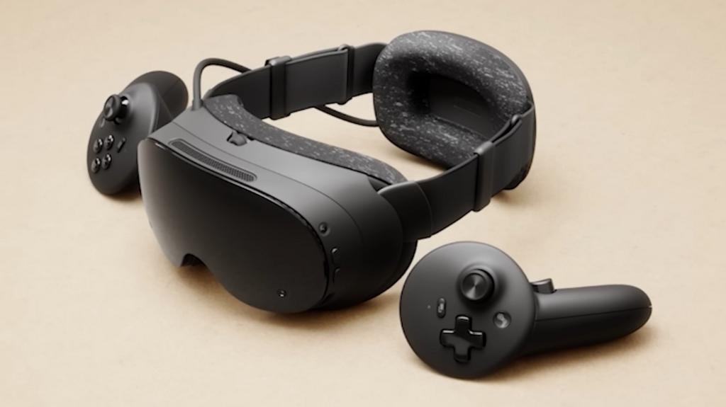 A Steam Frame with controllers either side of it
