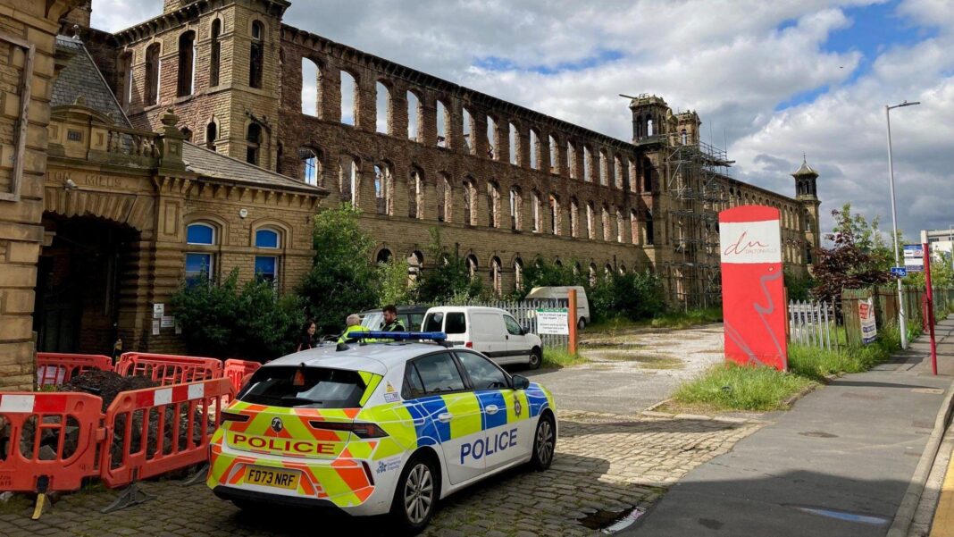 Major fire at derelict Peaky Blinders mill A police car parked outside