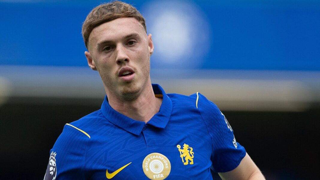 Chelsea forward Cole Palmer, wearing, the club's blue home kit, looks at the camera during a Premier League match
