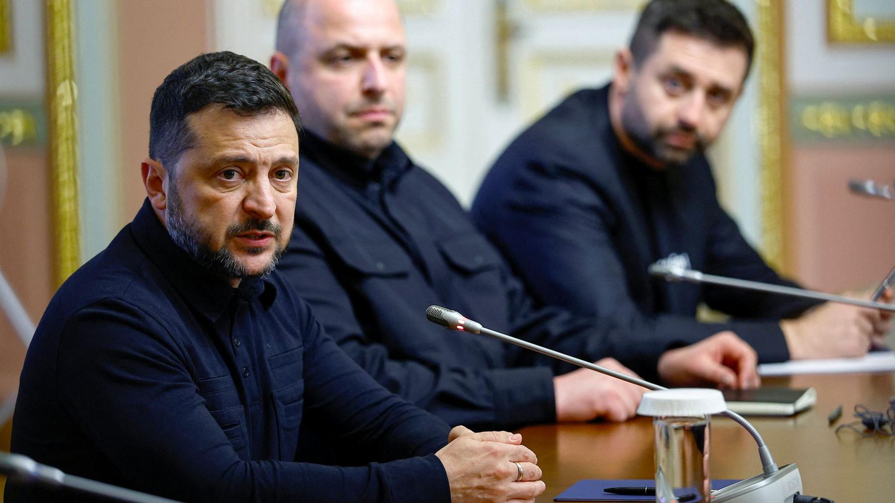 Ukraine's President Zelenskiy sitting at a table speaking to U.S. special representatives Witkoff and Kushner