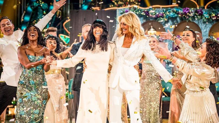 Dancers and judges on the Strictly Christmas show salute outgoing presenters Claudia Winkleman and Tess Daly, seen dressed in all white