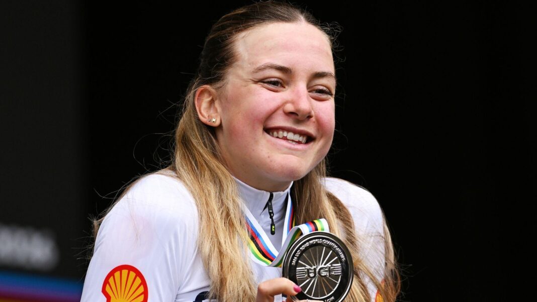 Bred for success – why Backstedt can hit cycling’s peaks Zoe Backstedt smiles holding her World Championship silver medal.