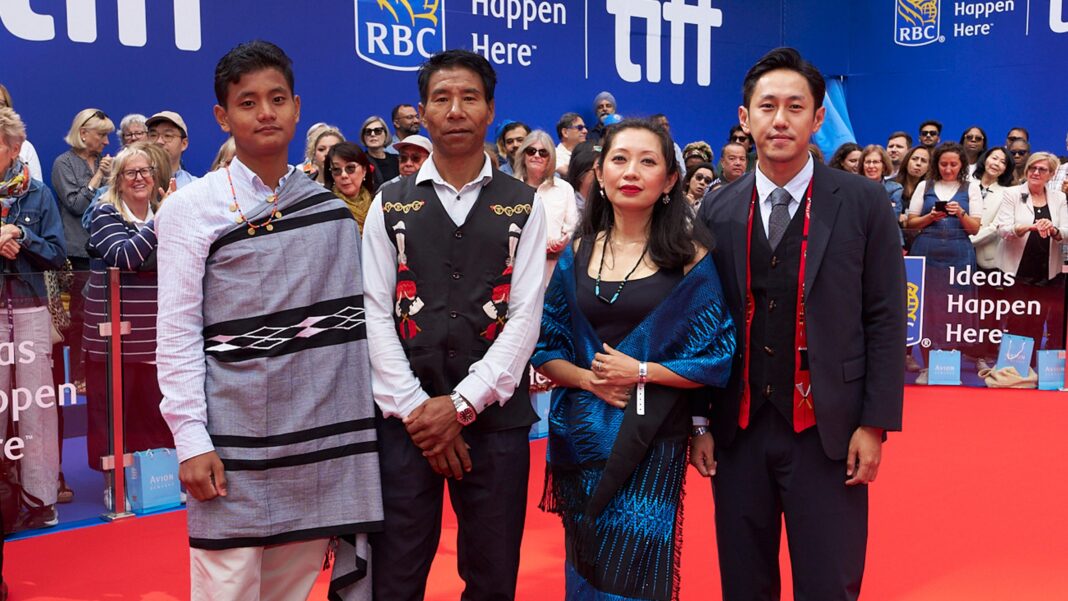 From Nagaland to a path to the Oscars: Indian film brings a rarely seen world to global cinema From right: Theja Rio poses with Nancy Nisa Beso, the film's producer, and actors Anglong Konyak (as the village chief, Anghba) and Sobino Rengma (as his son Amao)