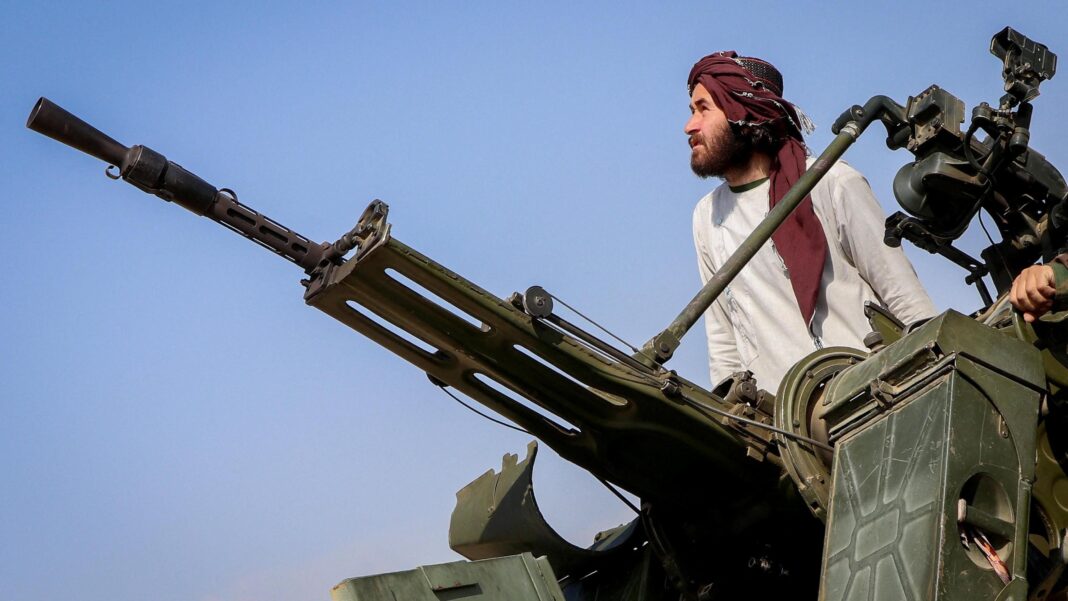 At least 21 killed after vehicle loaded with explosives rams Pakistan mosque A Taliban soldier stands next to an anti-aircraft gun while on lookout for Pakistani fighter jets, in Khost province, Afghanistan, February 27, 2026.