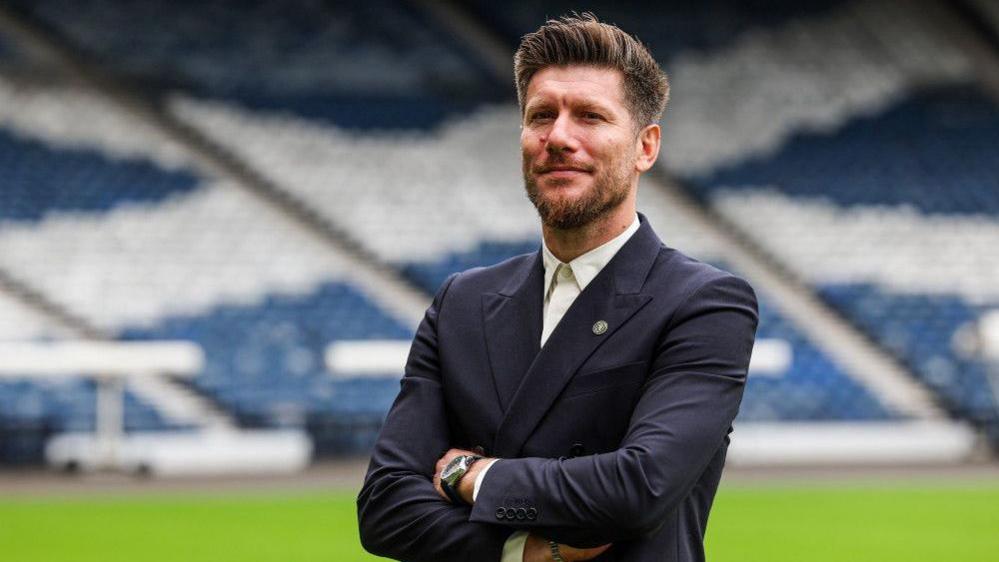 Sebastien Pocognoli poses for photographs at Hampden Park