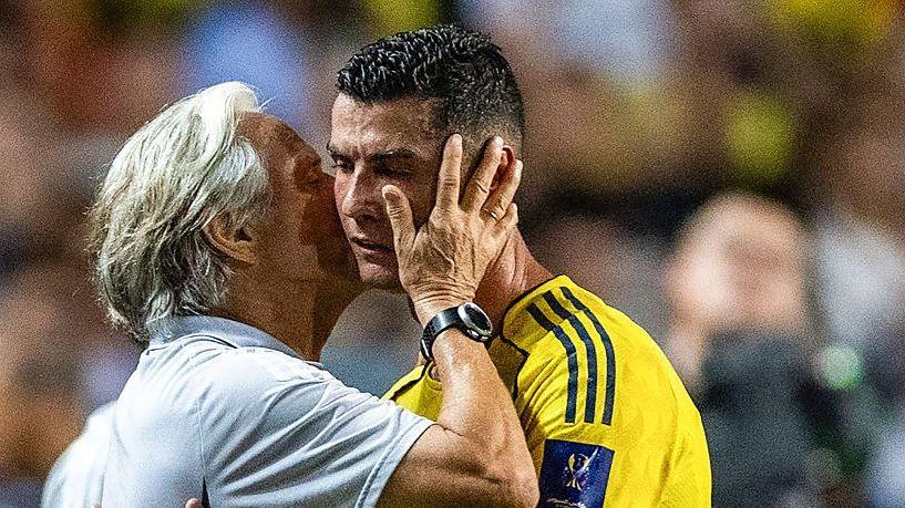Al-Nassr's head coach Jorge Jesus (left) embraces Cristiano Ronaldo