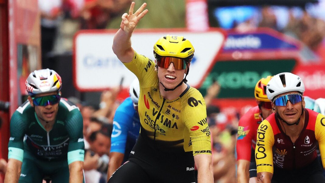 Matthew Brennan holds up three finger while he crossed the line in first place on stage 11 of the Vuelta a Espana
