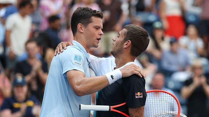 Alexander Blockx and Flavio Cobolli embrace after their US Open match