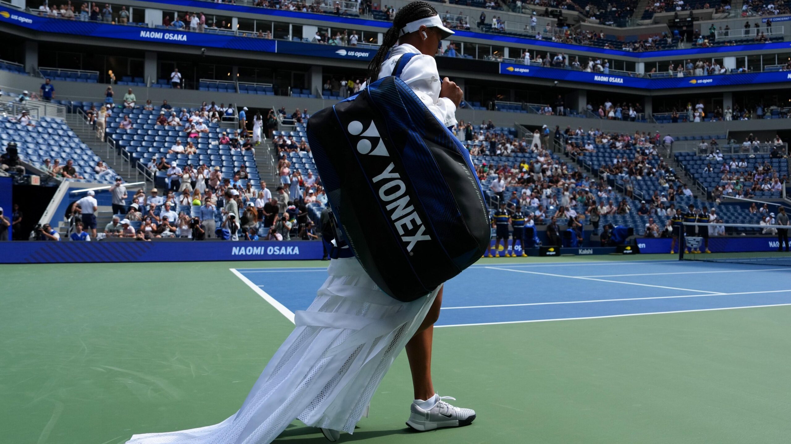 Naomi Osaka walks on to Arthur Ashe Stadium