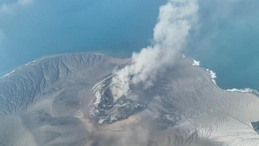A drone view shows Mount Anak Krakatau volcano spewing hot ash during an eruption