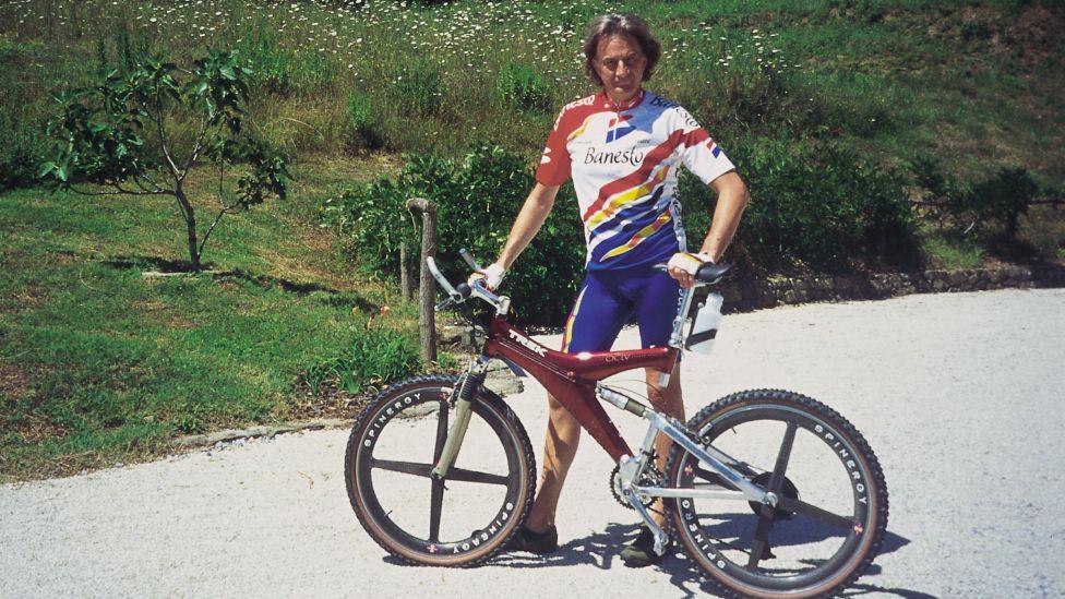 Sir Paul Smith pictured with a bicycle in Tuscany in the mid 1990s