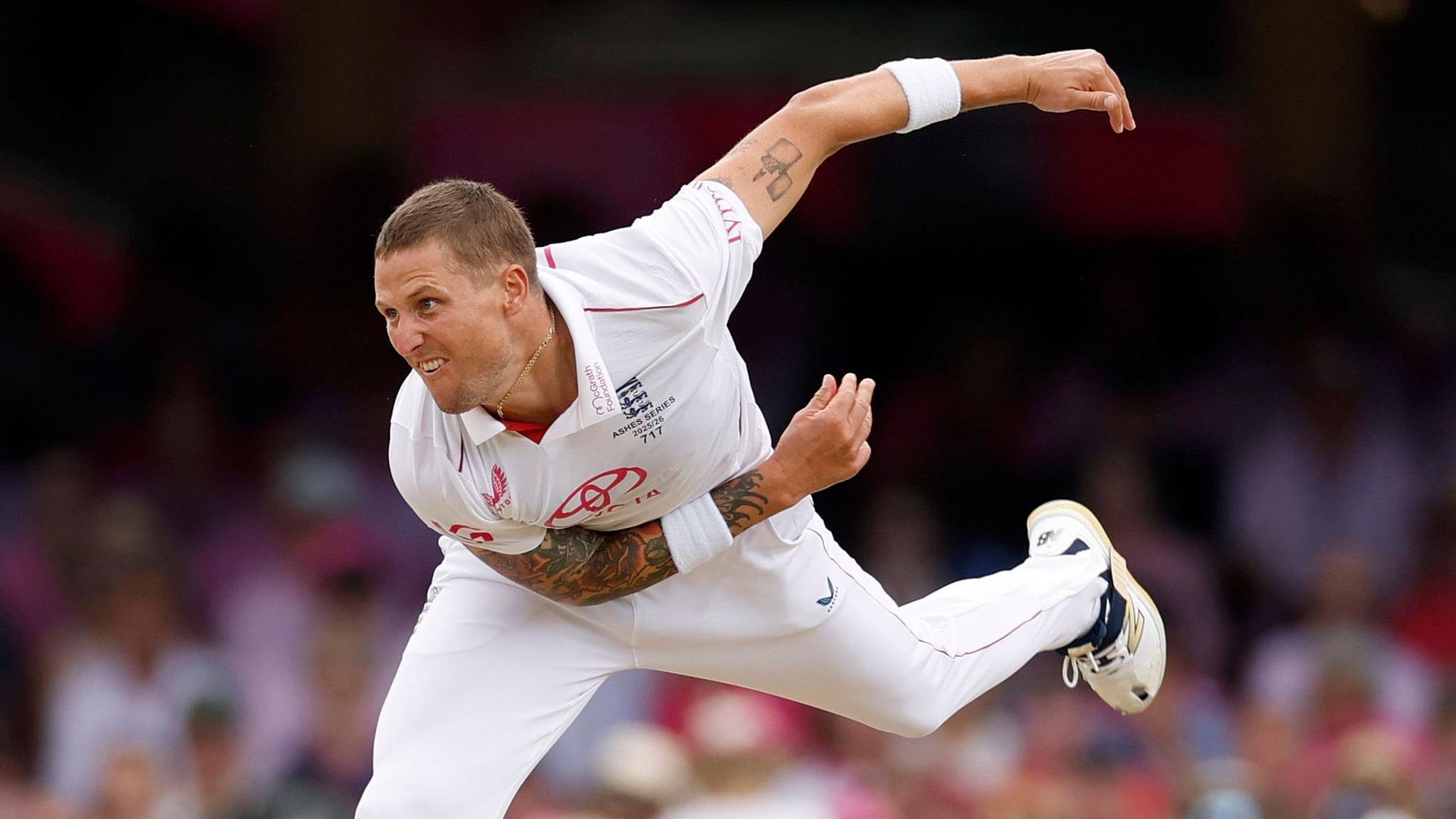 Brydon Carse bowling for England