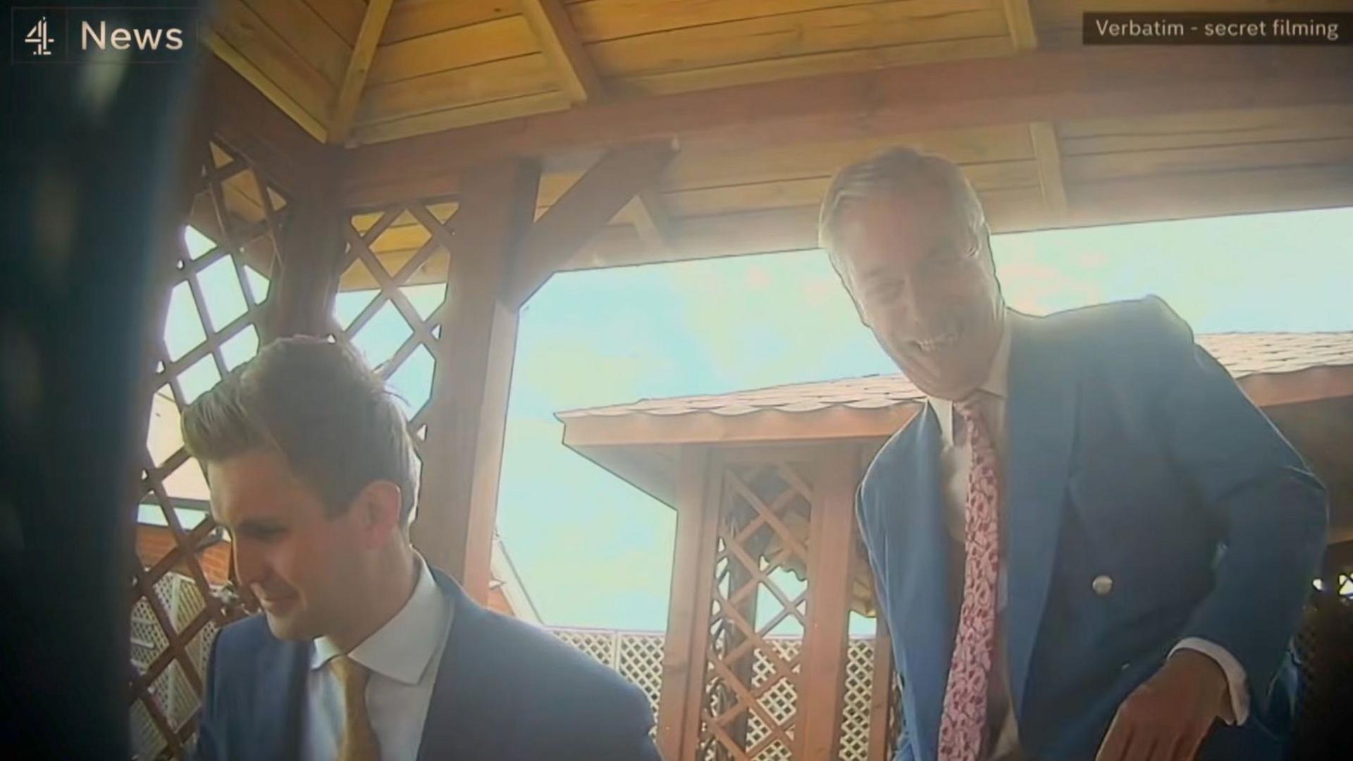 A shot of Dan Jukes and Nigel Farage in the Channel 4 News report.