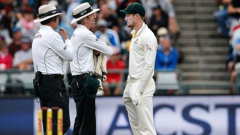 Cameron Bancroft is spoken to by the umpires during the 'sandpapergate' Test