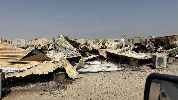 An undated photo of trailers destroyed by Iranian strike, Camp Buehring, Kuwait, obtained by CBS News.