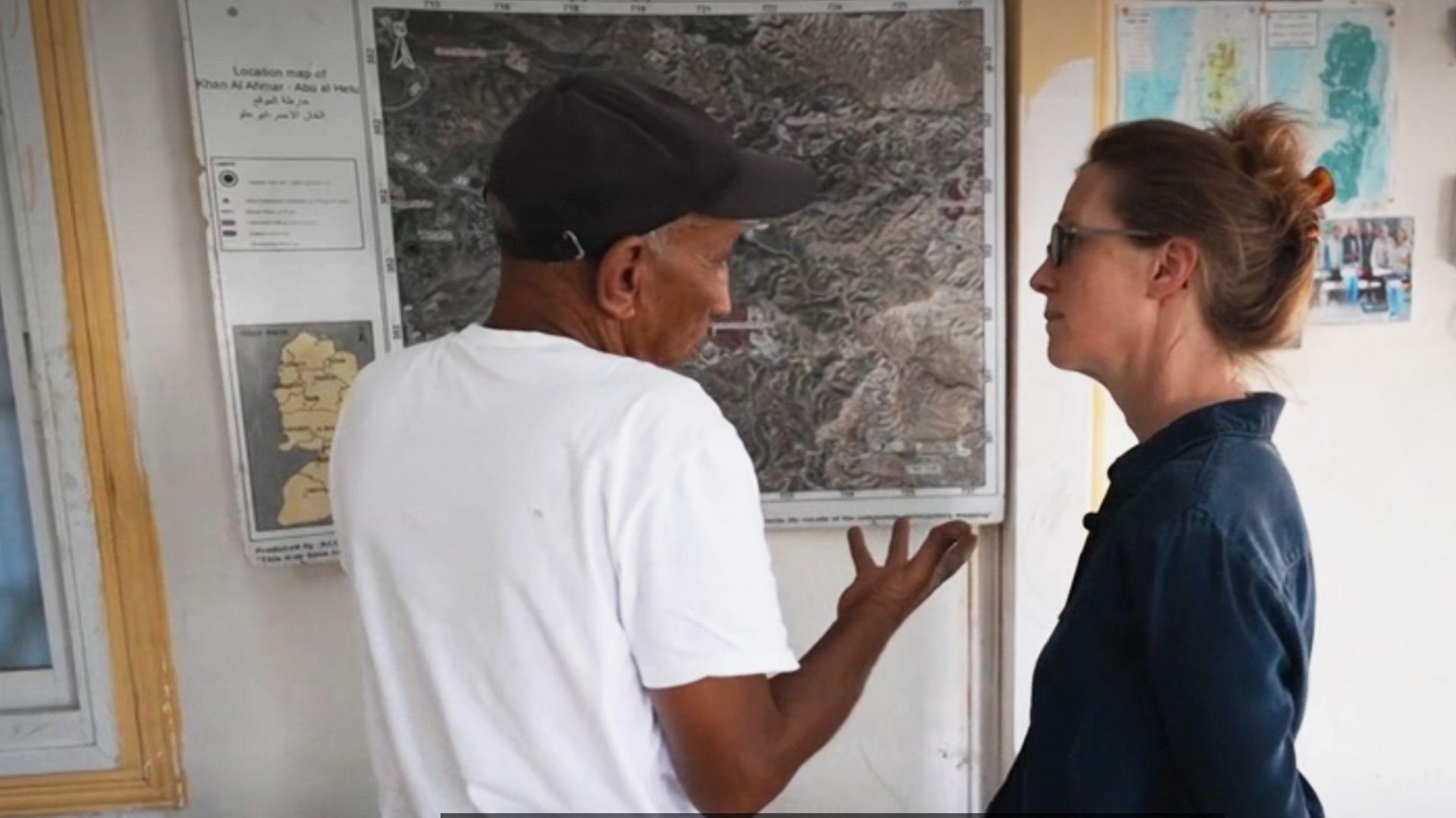 engrab or report showing Lucy Williamson speaking to Bedouin community leader Eid Khamis