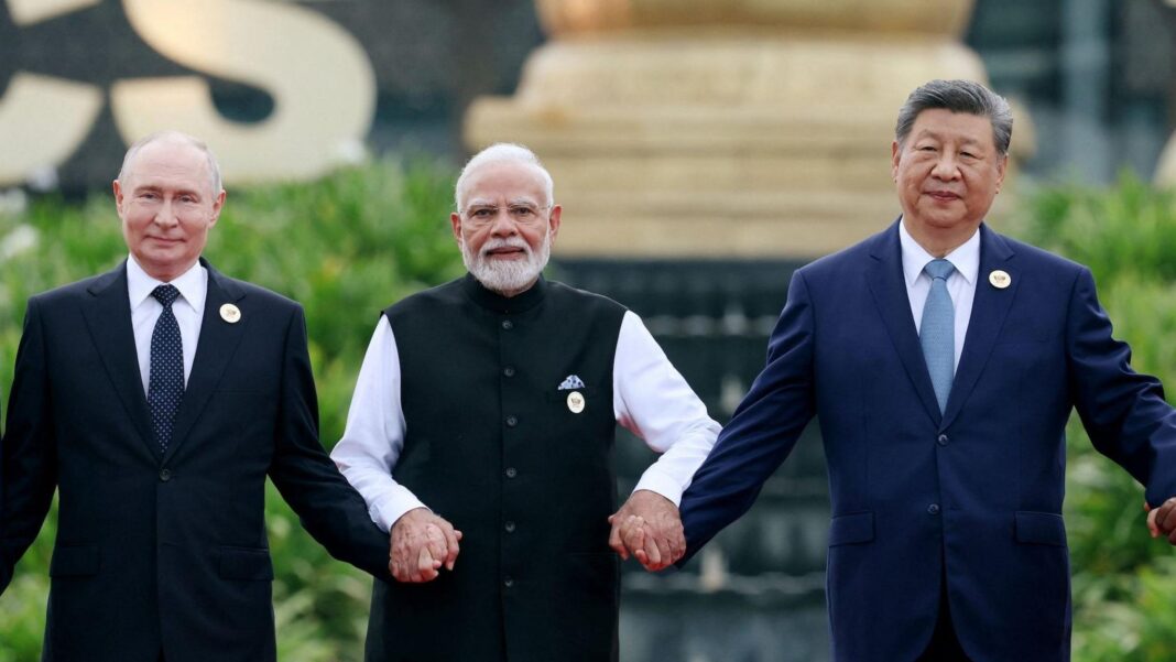 Iran war reshapes Brics ties but also exposes divisions Russia's President Vladimir Putin, India's Prime Minister Narendra Modi and China's President Xi Jinping pose for a family photo during the BRICS summit in New Delhi, India, September 12, 2026