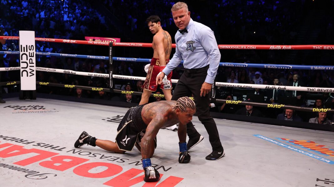 Conor Benn puts his hands down on the canvas