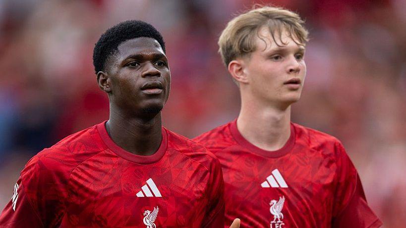 Mor Talla Ndiaye with Liverpool team mate Will Wright