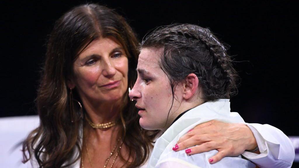 Bridget Taylor consoles her daughter Katie Taylor