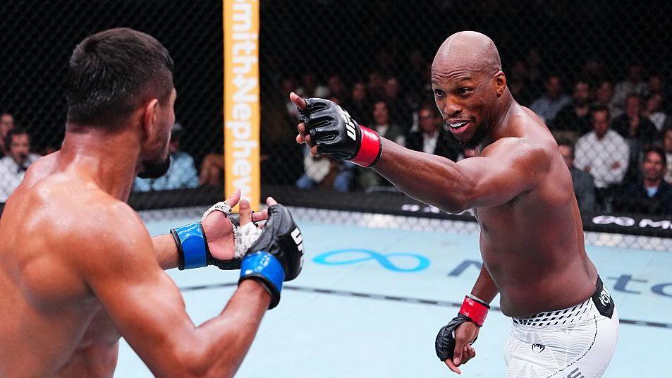 Michael 'Venom' Page in action against Nursulton Ruziboev at UFC Paris