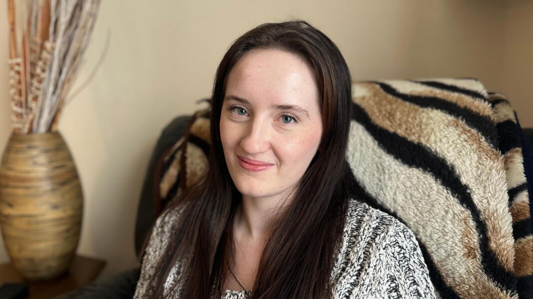 Endometriosis trial gives hope to millions of women in pain like me A photo of Freya sat down in front of a tiger print rug. She has long brown hair and is wearing a jumper.