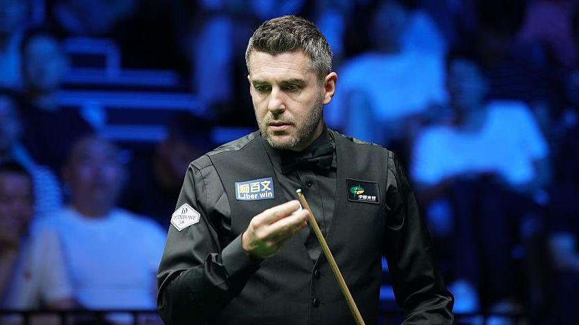 Selby, Trump and Williams through in English Open first round Mark Selby chalking his cue