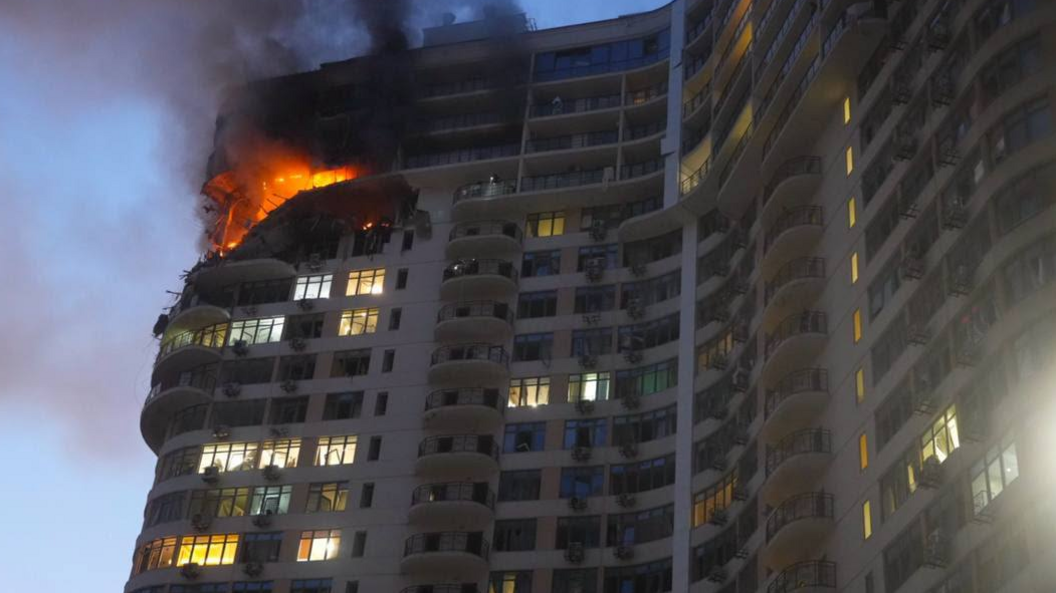 A fire burns at top floors of a multi-storey residential building in Odesa, southern Ukraine, following a Russian aerial attack. Photo: 12 September 2026.