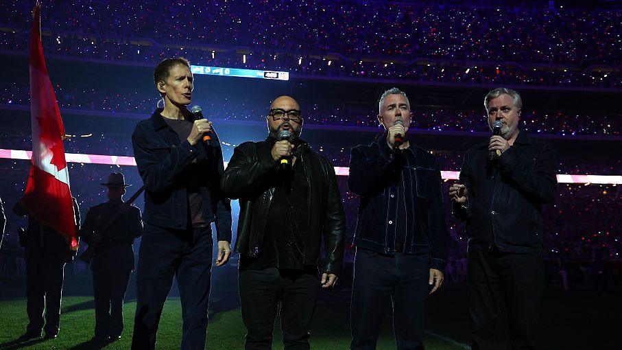 Barenaked Ladies sing the Canadian national anthem prior to the game between the Buffalo Bills and the Detroit Lions at Highmark Stadium