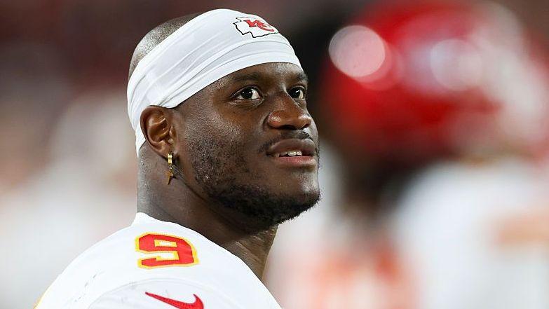 Kenneth Walker looks on while standing on the sideline during the Kansas City Chiefs' pre-season game against the Tampa Bay Buccaneers in August 2026