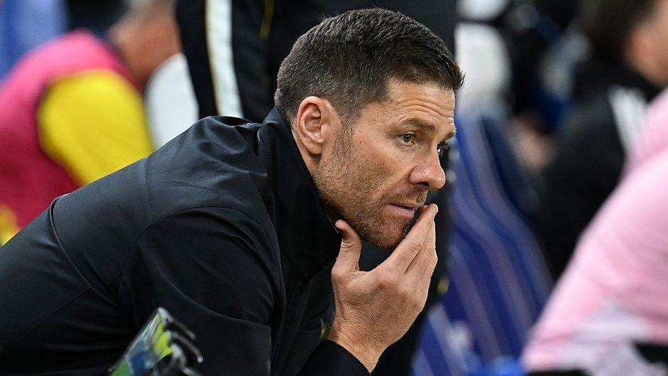 Xabi Alonso looking concerned while managing Chelsea
