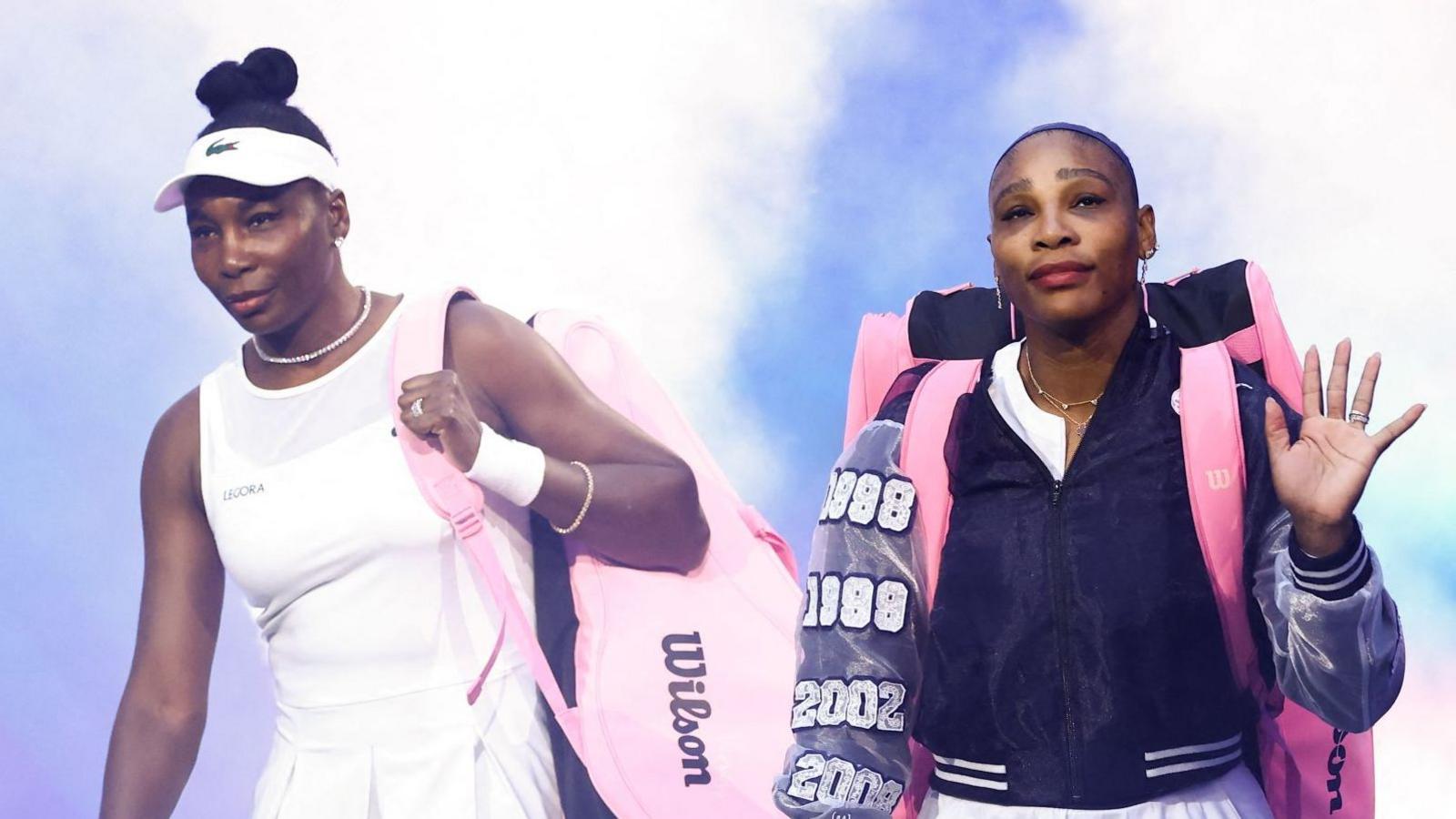 Venus and Serena Williams walk out onto Arthur Ashe Stadium at the 2026 US Open